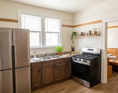 8245 S Evans Avenue - Photo Thumbnail 2