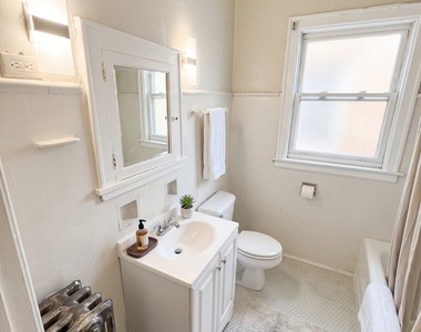 8245 S Evans Avenue - Photo Thumbnail 3