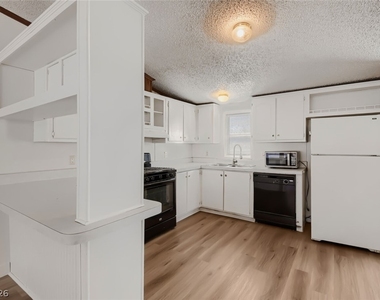 6105 Berthelot Lane - Photo Thumbnail 6