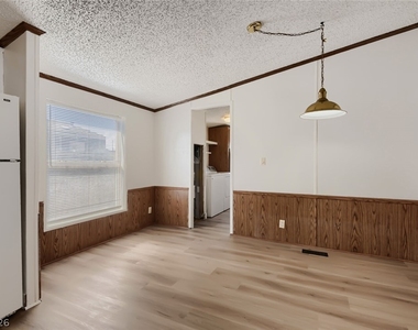 6105 Berthelot Lane - Photo Thumbnail 3