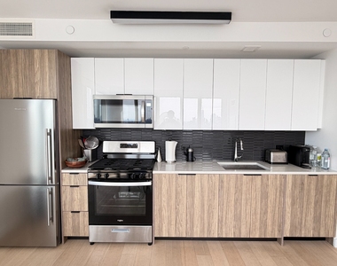 1-15 57th Avenue - Photo Thumbnail 1