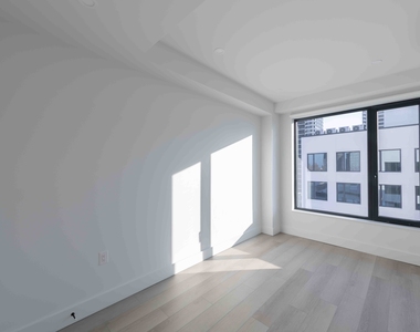 215 East 124th Street - Photo Thumbnail 3