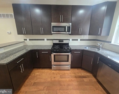 1338 S. Bancroft Street - Photo Thumbnail 3