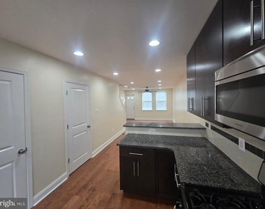 1338 S. Bancroft Street - Photo Thumbnail 4