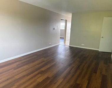 6617 W Lloyd Drive - Photo Thumbnail 2