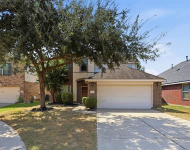 21307 Drifting Oaks Drive - Photo Thumbnail 1