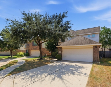 21307 Drifting Oaks Drive - Photo Thumbnail 2