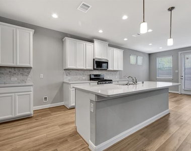 9828 Rugged Oaks Drive - Photo Thumbnail 2
