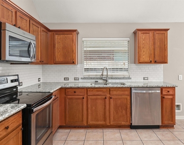 7611 Waterlilly Lane - Photo Thumbnail 6