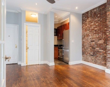 East 32nd St - Photo Thumbnail 2