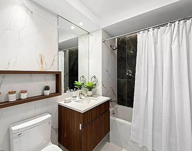228 East 135th Street - Photo Thumbnail 3