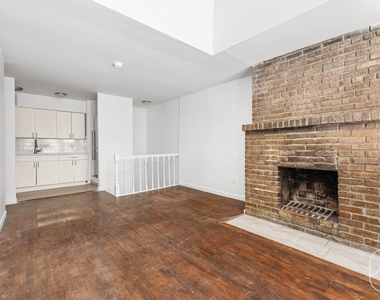 313 W 29th Street - Photo Thumbnail 4