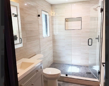 1917 W 37th St - Photo Thumbnail 3