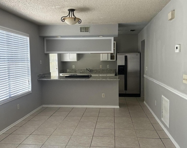 6476 Sable Woods Drive E - Photo Thumbnail 2