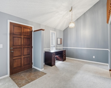 11418 Beacon Drive N - Photo Thumbnail 2