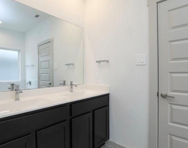 7311 Ramsgate Cliff Lane - Photo Thumbnail 5
