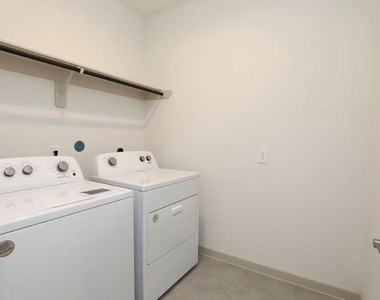 7311 Ramsgate Cliff Lane - Photo Thumbnail 4
