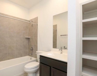 7311 Ramsgate Cliff Lane - Photo Thumbnail 6
