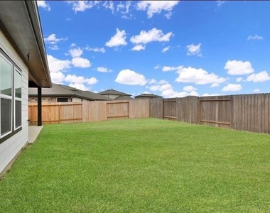 7311 Ramsgate Cliff Lane - Photo Thumbnail 3