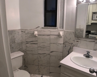 East 84 Street - Photo Thumbnail 3