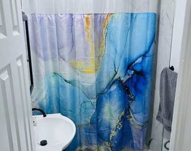 116 Ne Davis Street - Photo Thumbnail 5