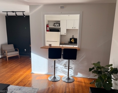 5012 Christopher St - Photo Thumbnail 2