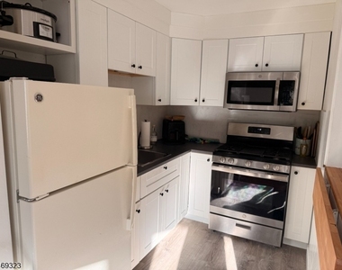 5012 Christopher St - Photo Thumbnail 3