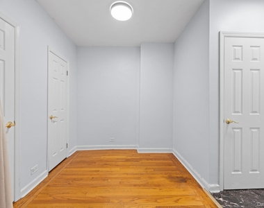 110-34 73rd Road - Photo Thumbnail 4