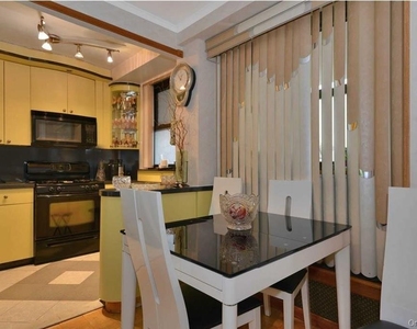 61-15 98 Street - Photo Thumbnail 9