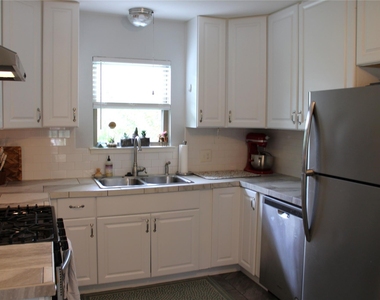 5703 Woodview Ave - Photo Thumbnail 4