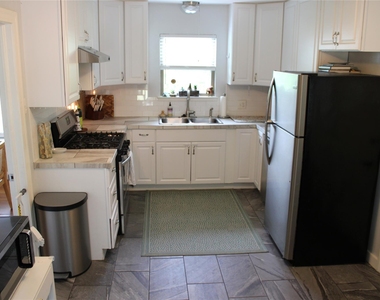 5703 Woodview Ave - Photo Thumbnail 3