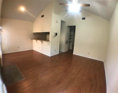 706 W 24th St - Photo Thumbnail 1