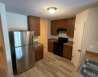 4676 Playschool Drive - Photo Thumbnail 2