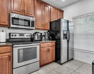 8525 Trail Wind Drive - Photo Thumbnail 8