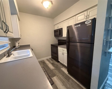 11083 Valencia Avenue - Photo Thumbnail 8