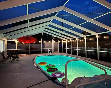 8628 Magnolia Drive - Photo Thumbnail 1