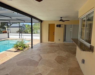 6957 Nw 9th Court - Photo Thumbnail 2