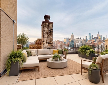 166 East 2nd Street - Photo Thumbnail 2
