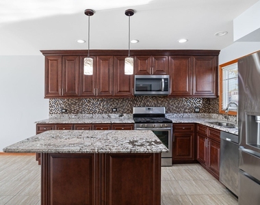 9065 W Oaks Avenue - Photo Thumbnail 9