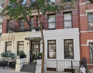 W 51st St. - Photo Thumbnail 2