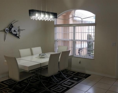 1566 Sw Flagami Road - Photo Thumbnail 2