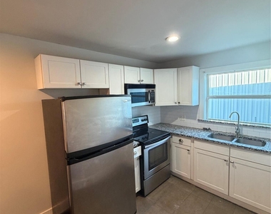 1107 S Ewing Avenue - Photo Thumbnail 1