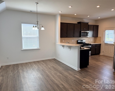 7106 Thornrose Drive - Photo Thumbnail 2