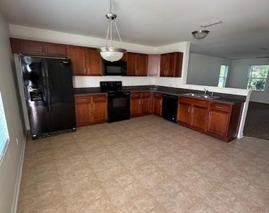 10710 Derryrush Drive - Photo Thumbnail 2