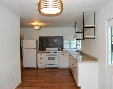 1308 E 12th Street - Photo Thumbnail 1