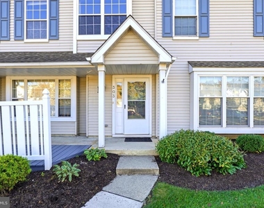 303 Oswego Court - Photo Thumbnail 1
