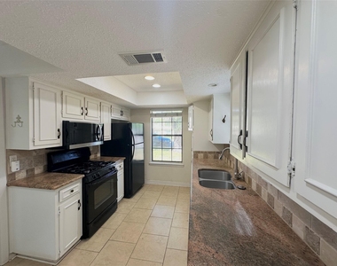 7311 Danwood Dr - Photo Thumbnail 7