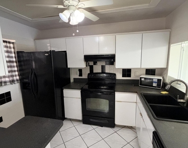9510 Seagrape Drive - Photo Thumbnail 3