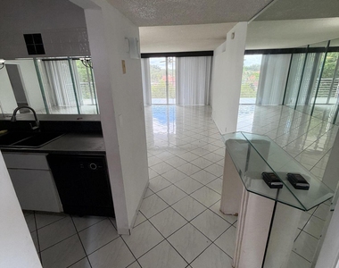 9510 Seagrape Drive - Photo Thumbnail 2