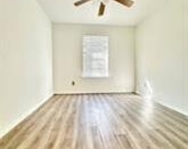 3110 N Harding Street - Photo Thumbnail 2